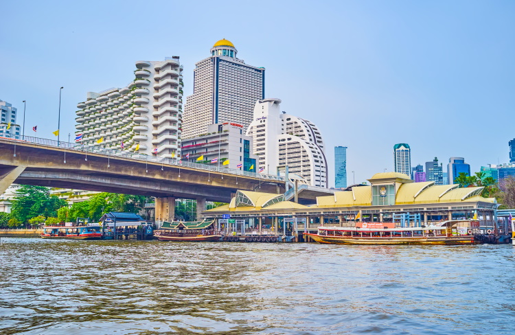 Sathorn Pier In Bangkok And Taksin Bridge