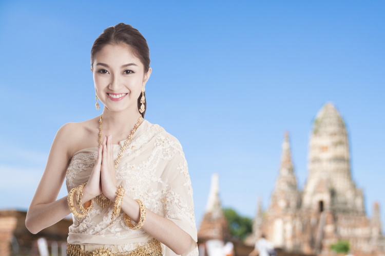 Thai Woman In Traditional Thai Clothes With Wai