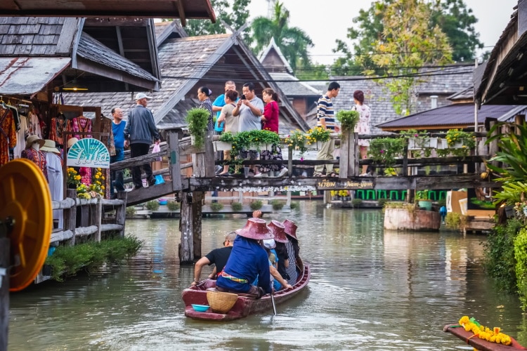 Boat Rowing And Tourists At Pattaya Floating Market