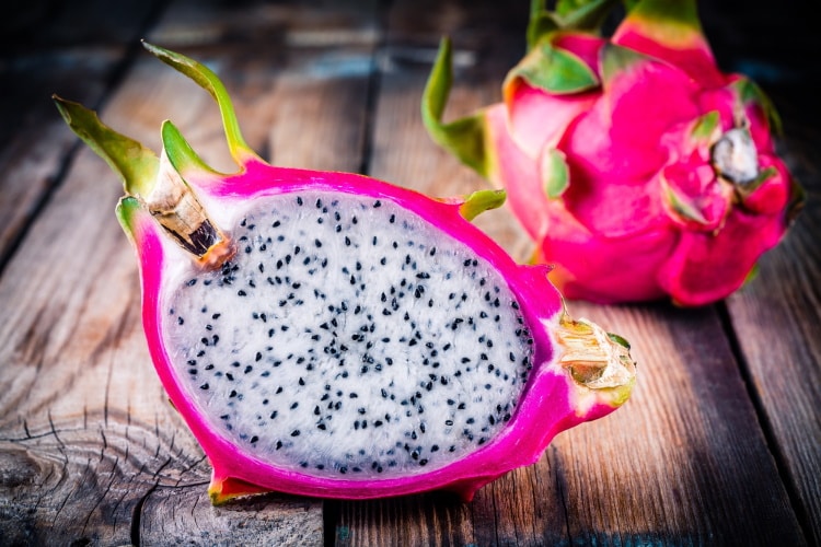Tropical Dragon Fruit Or Pitaya On Wooden Rustic Background
