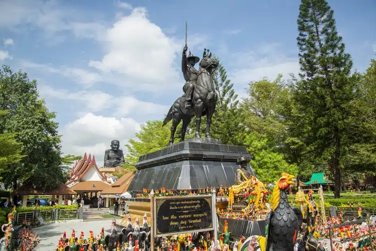 A King Taksin Monument At The Wat Huay Mongkol Near The City Of Hua Hin In Thailand