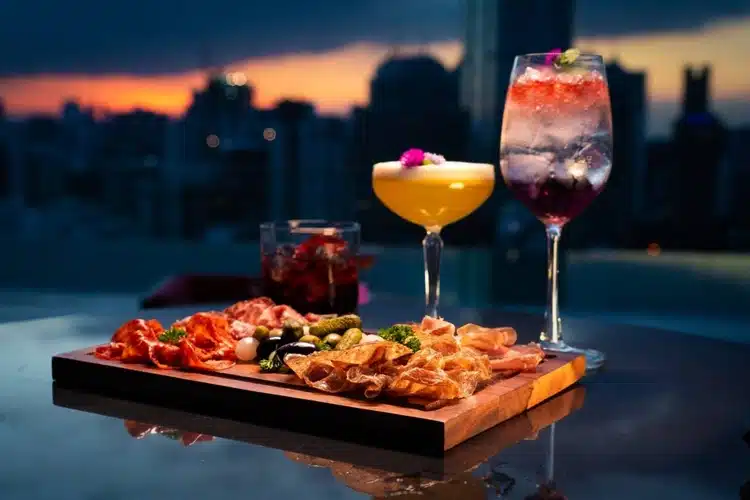 Close Up Of Food And Drink At Redsquare Rooftop Bar Novotel On Soi 4 In Bangkok